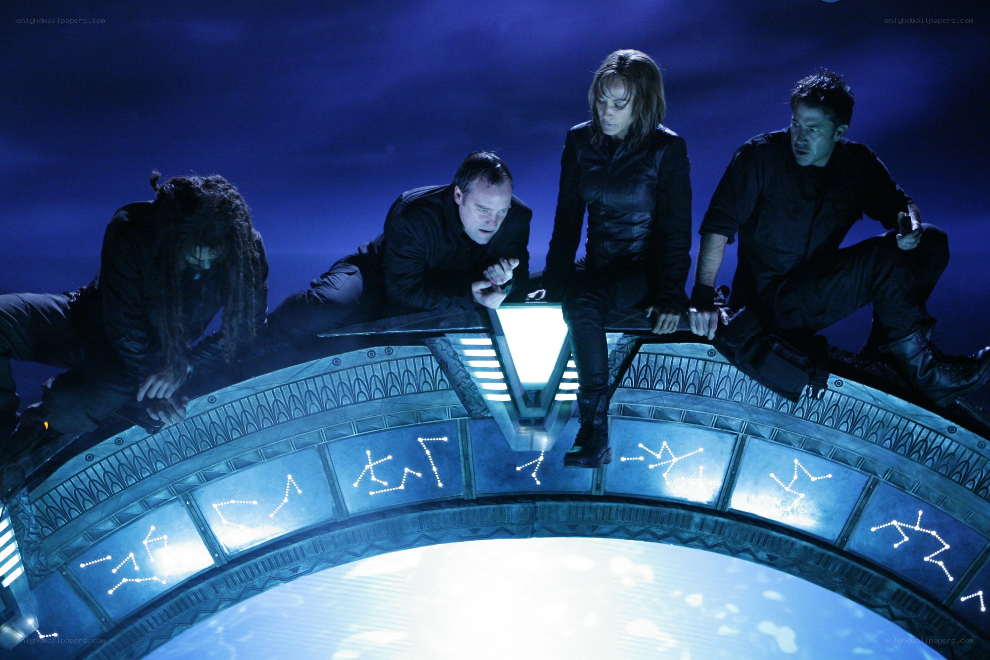 Stargate team on alien device