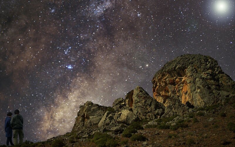 Stargazing on a rocky hill