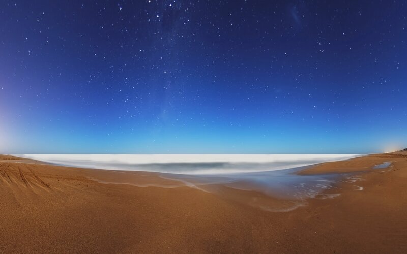 Starlit Beach at Night