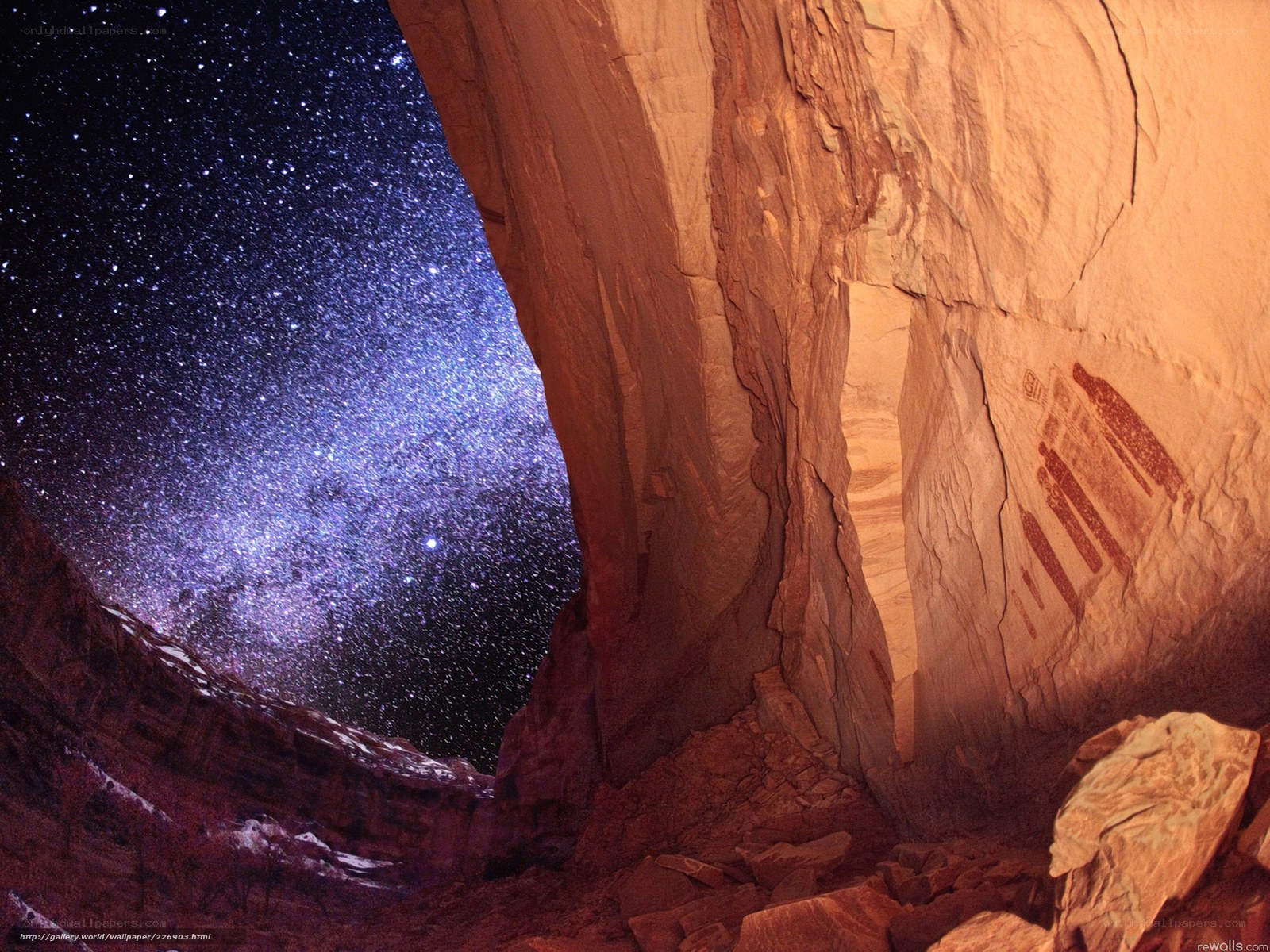 Starlit cave with petroglyphs