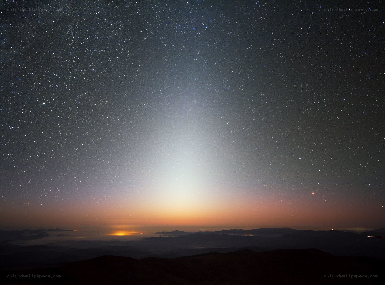 Starlit sky with light beam