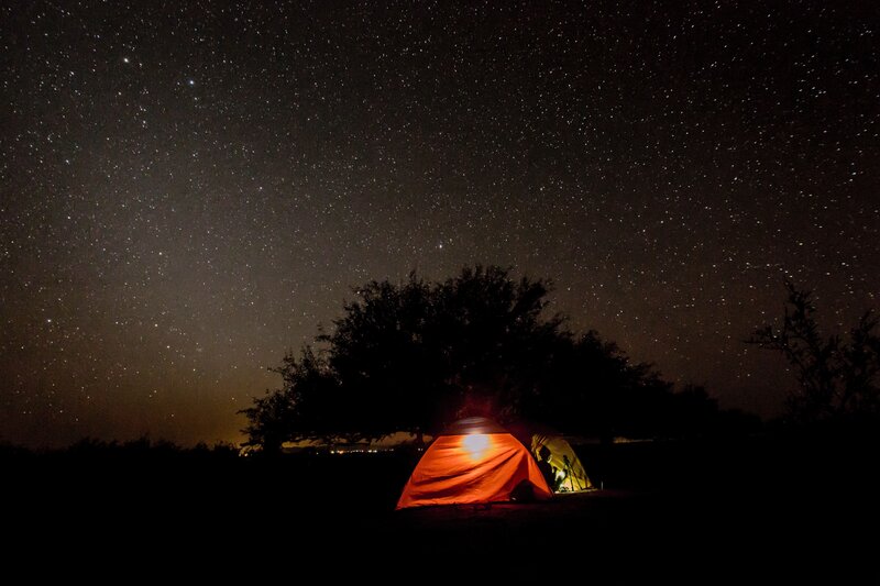 Starry night camping scene