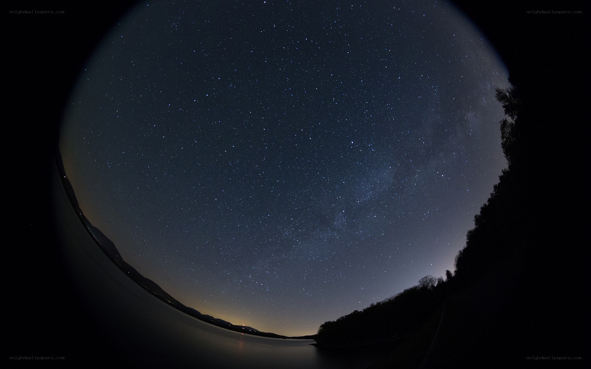 Starry night over a lake