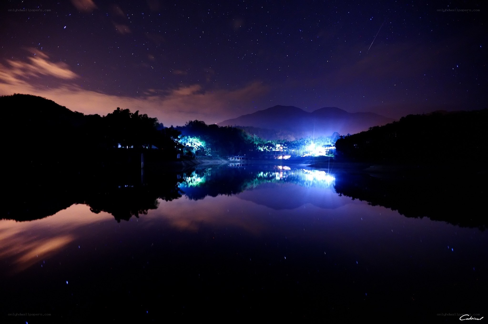 Starry night over a lake