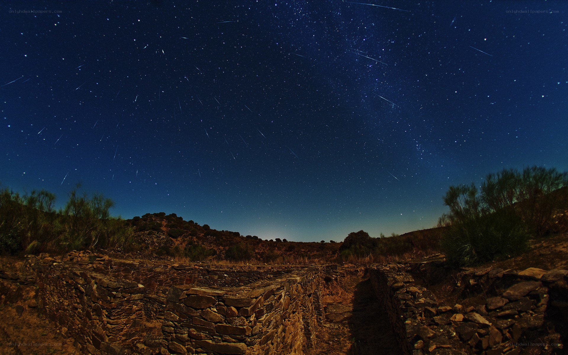 Starry night over ancient ruins