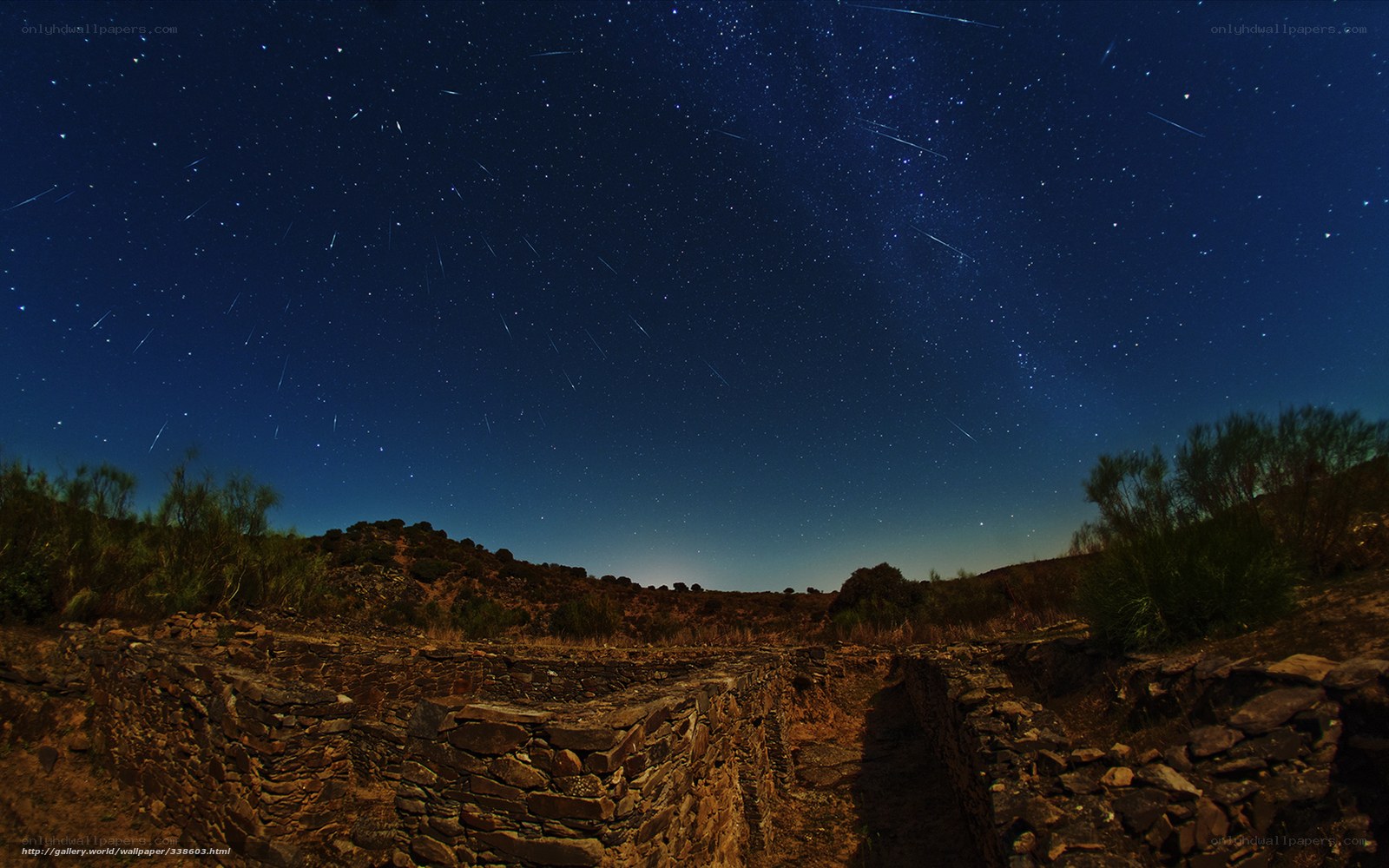 Starry night over ancient ruins