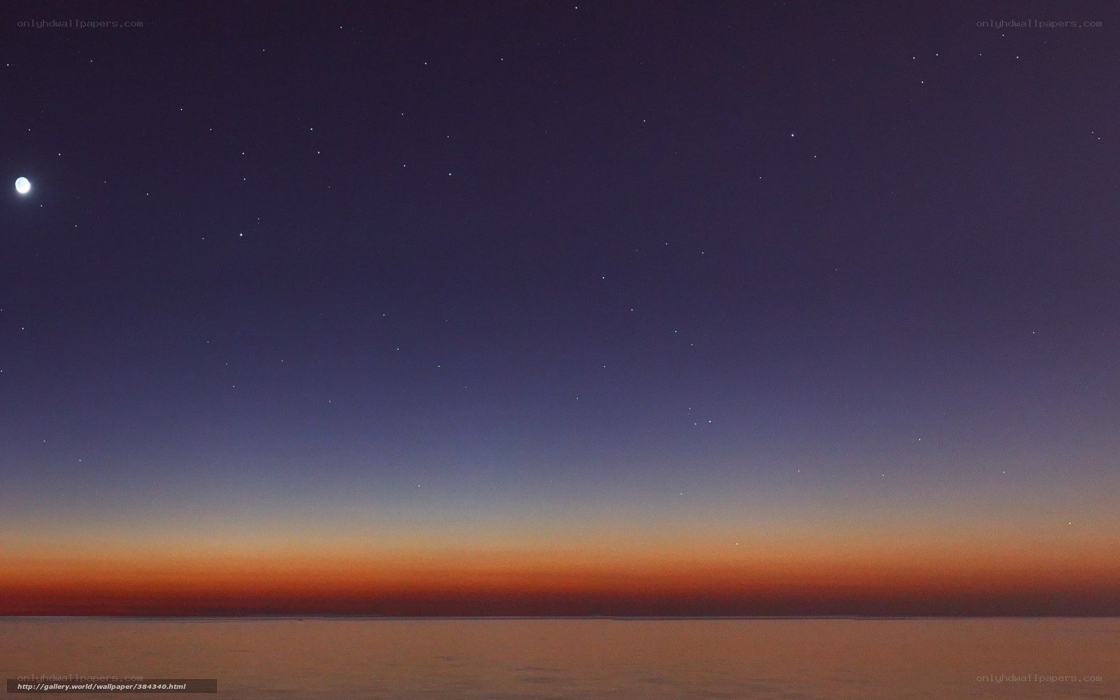 Starry night over calm sea