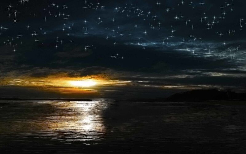Starry night over calm water