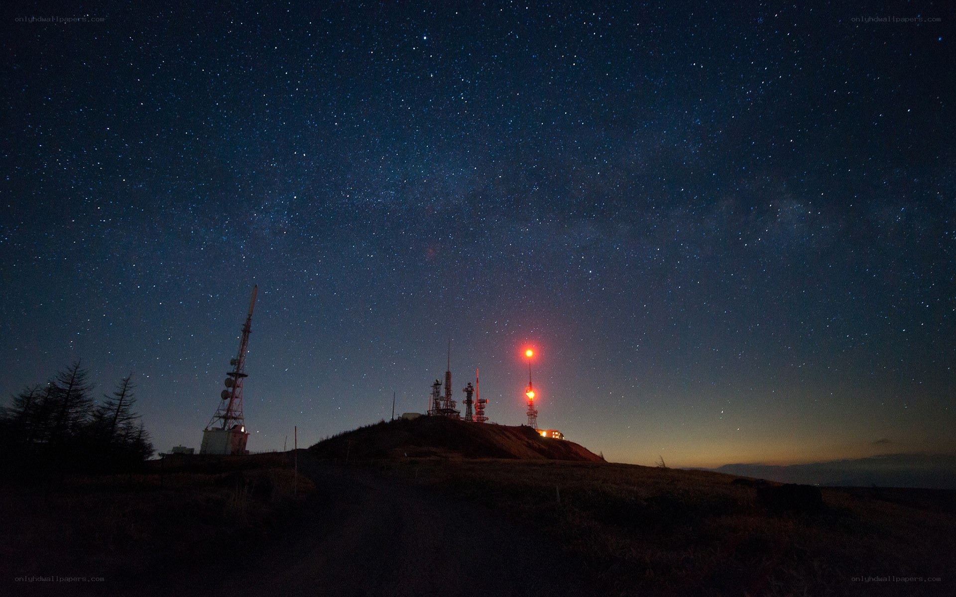 Starry night over communication towers