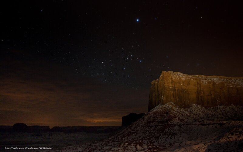 Starry night over desert rock