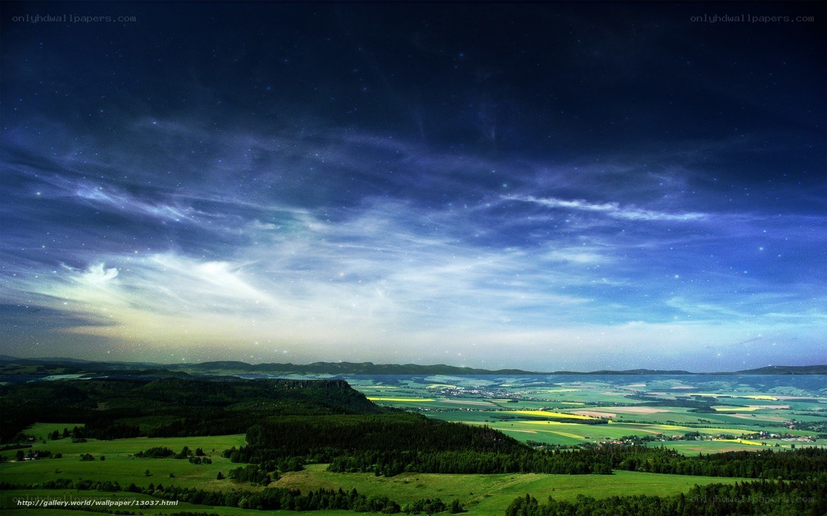 Starry night over green fields