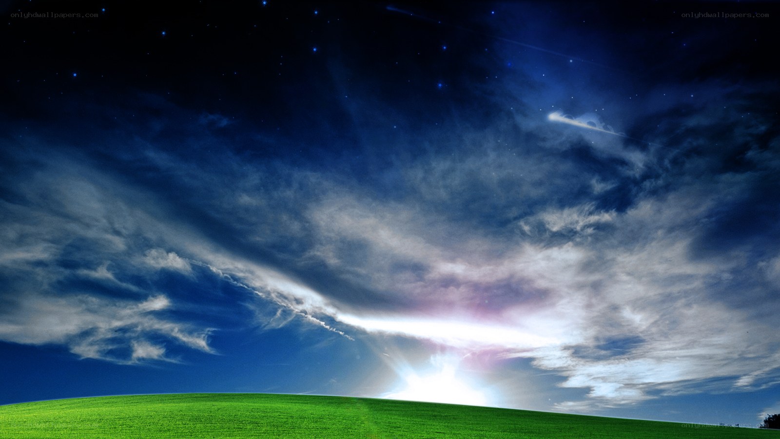 Starry night over green hill