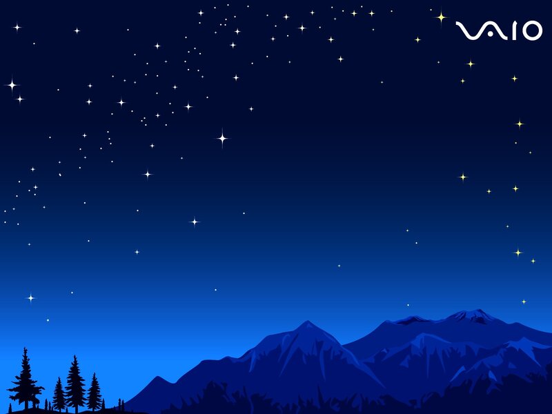 Starry night over mountains