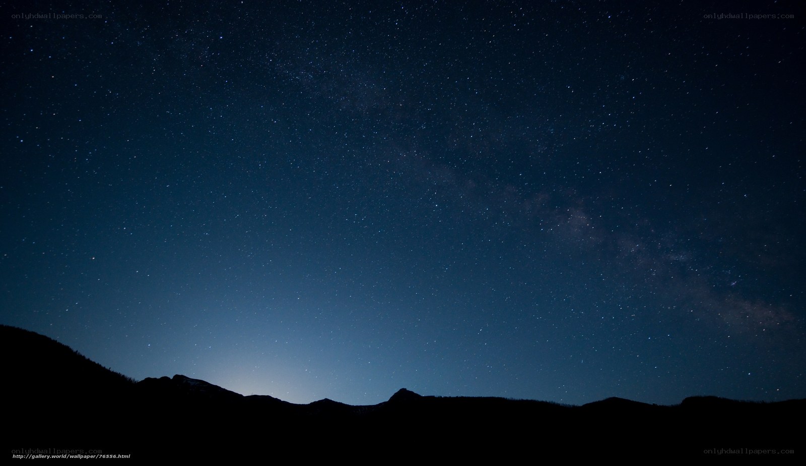 Starry night over mountains