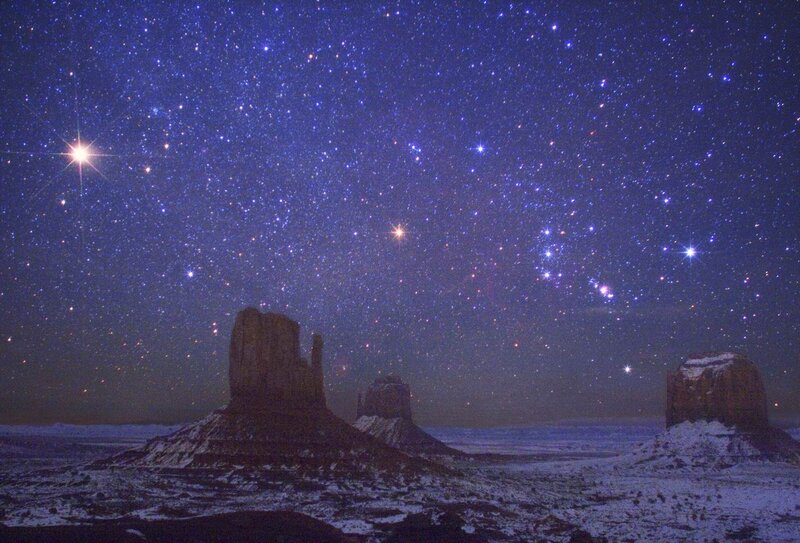 Starry night over rock formations