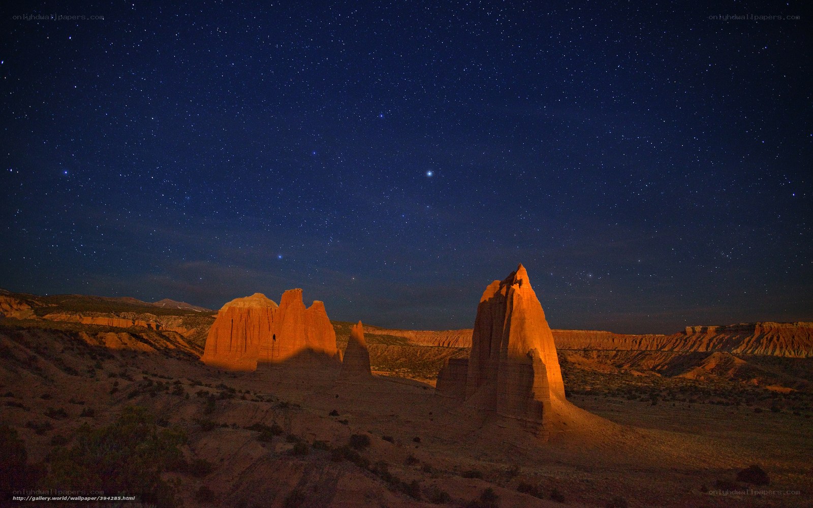 Starry night over rock formations