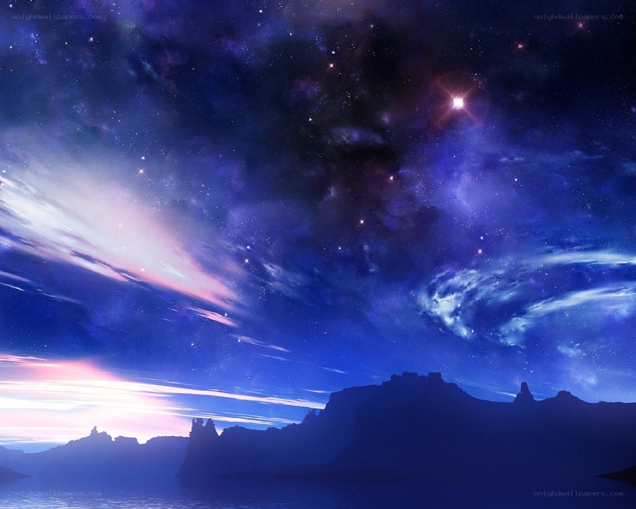 Starry night over rocky coast