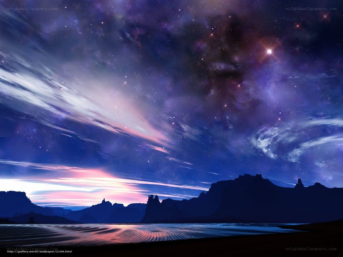 Starry night over rocky landscape