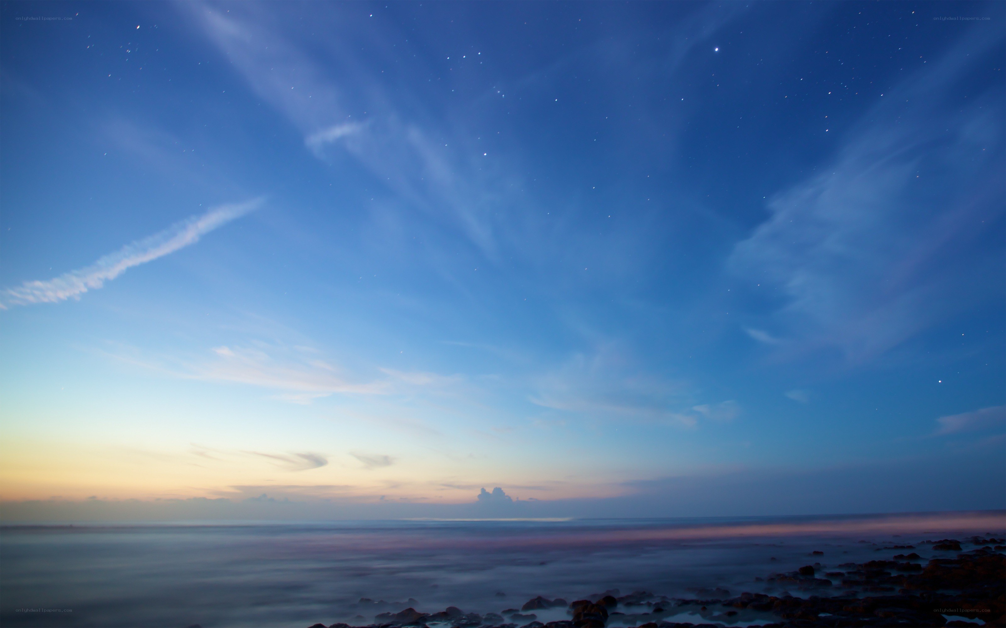 Starry night over the ocean