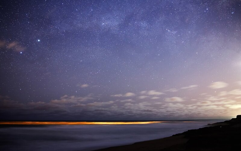 Starry night over the ocean