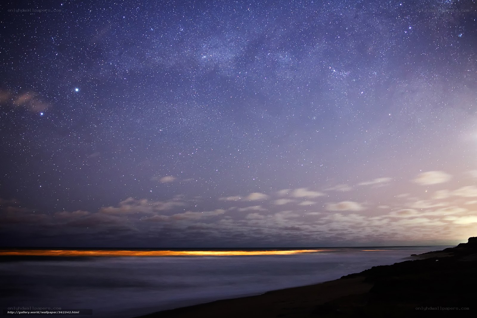 Starry night over the ocean