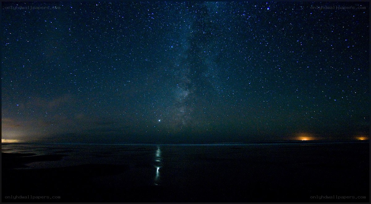 Starry night over the ocean