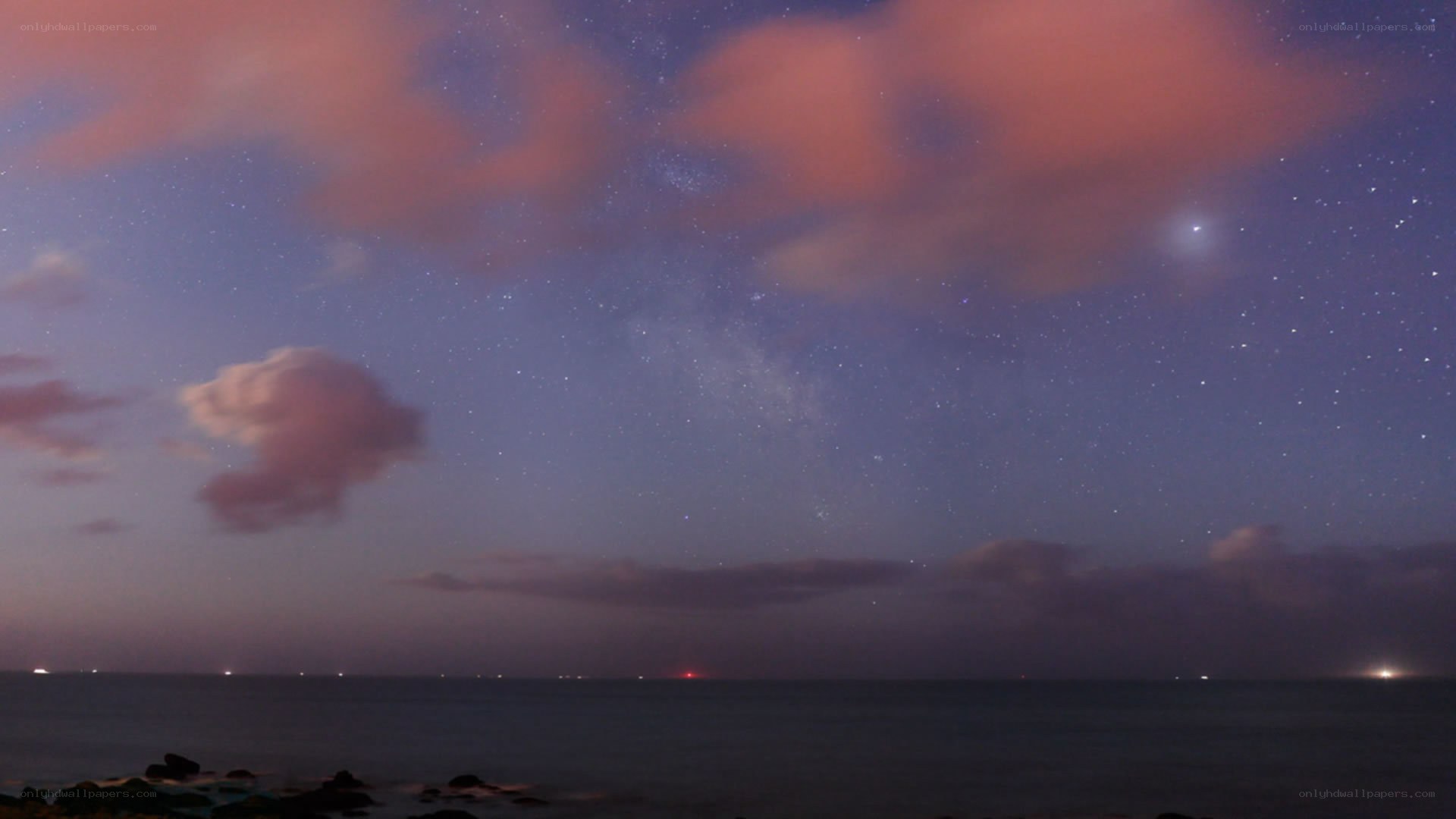 Starry night over the ocean
