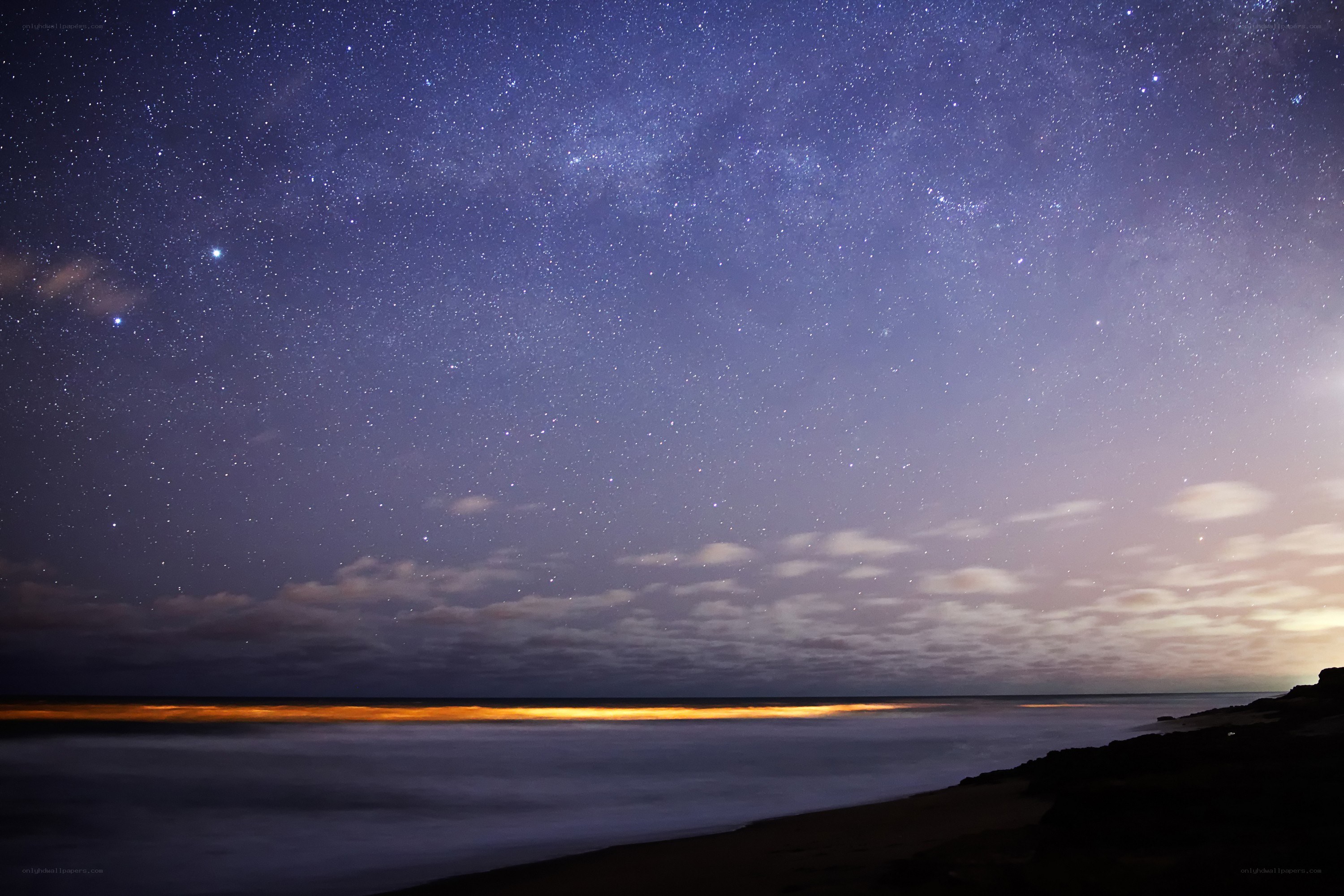 Starry night over the ocean