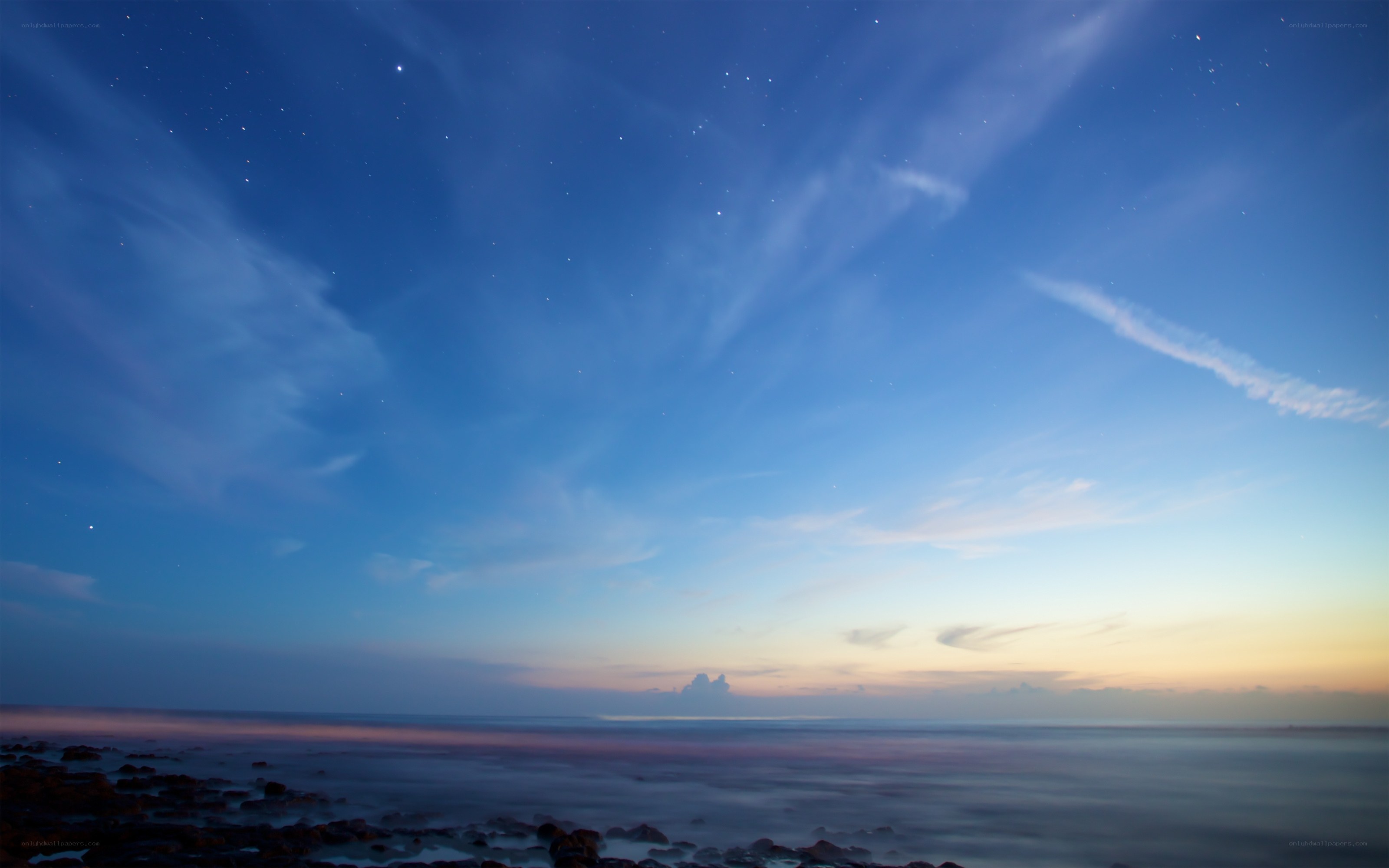 Starry night over the ocean