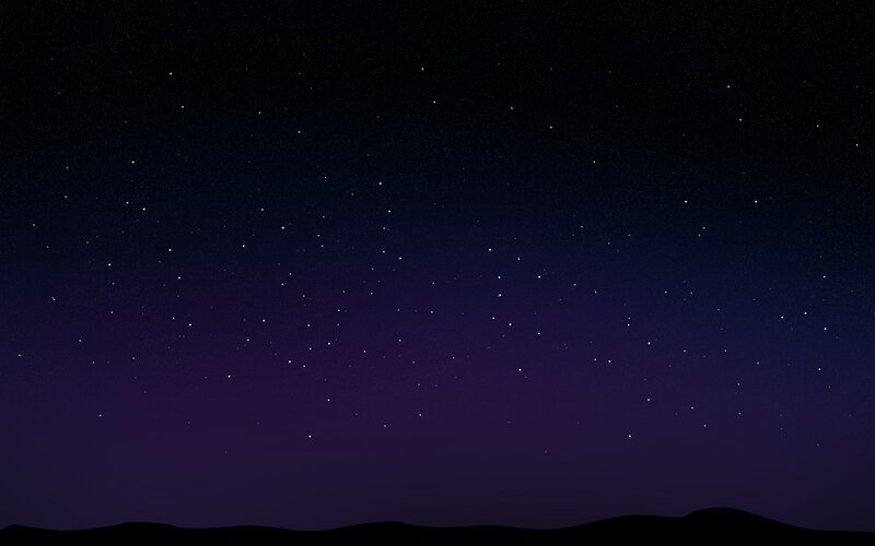 Starry night sky over hills