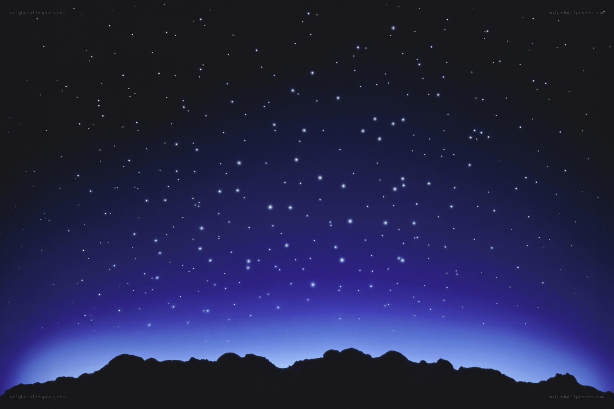 Starry night sky over mountains