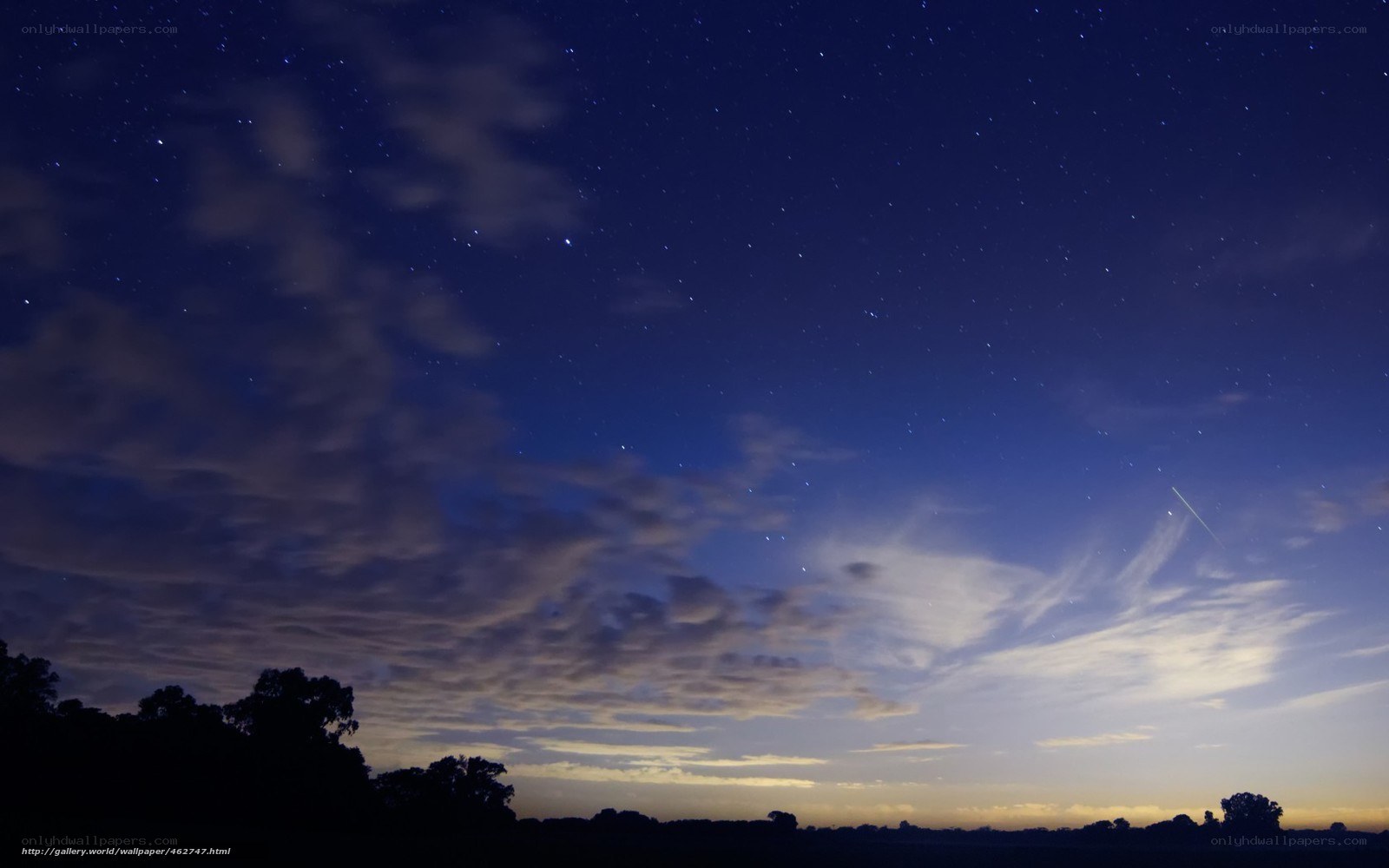 Starry night sky with meteor