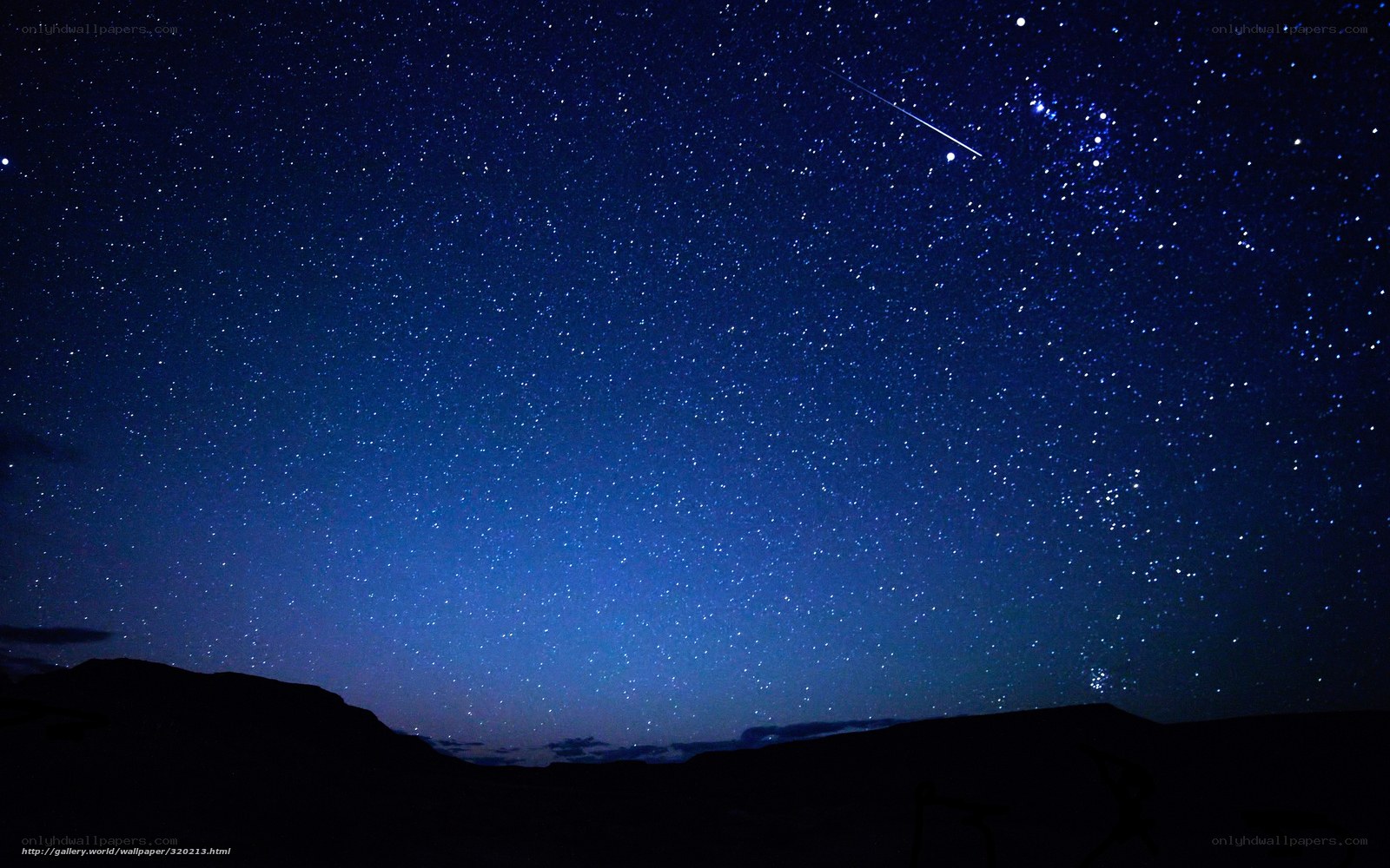 Starry night sky with meteor