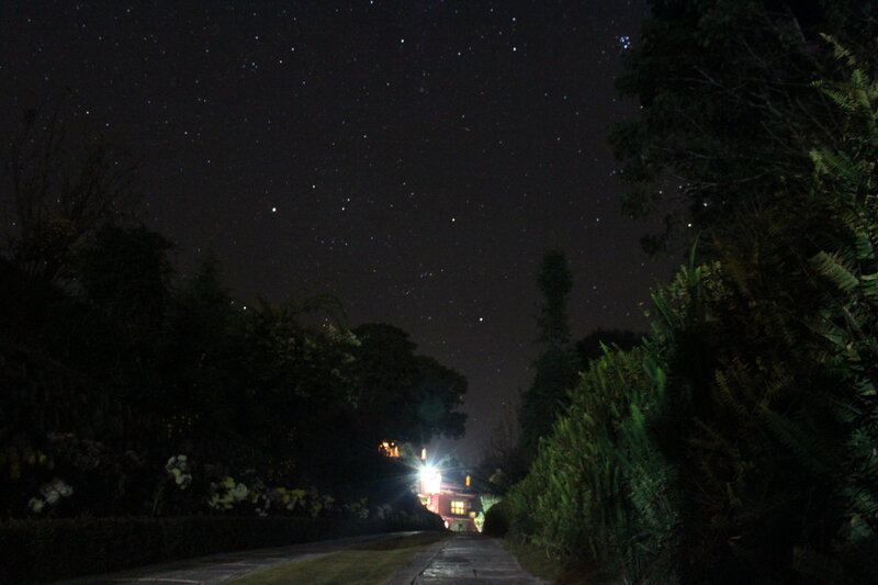 Starry night with house light