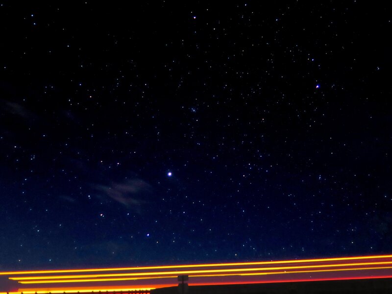 Starry night with light trails