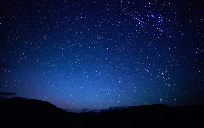Starry night with meteor