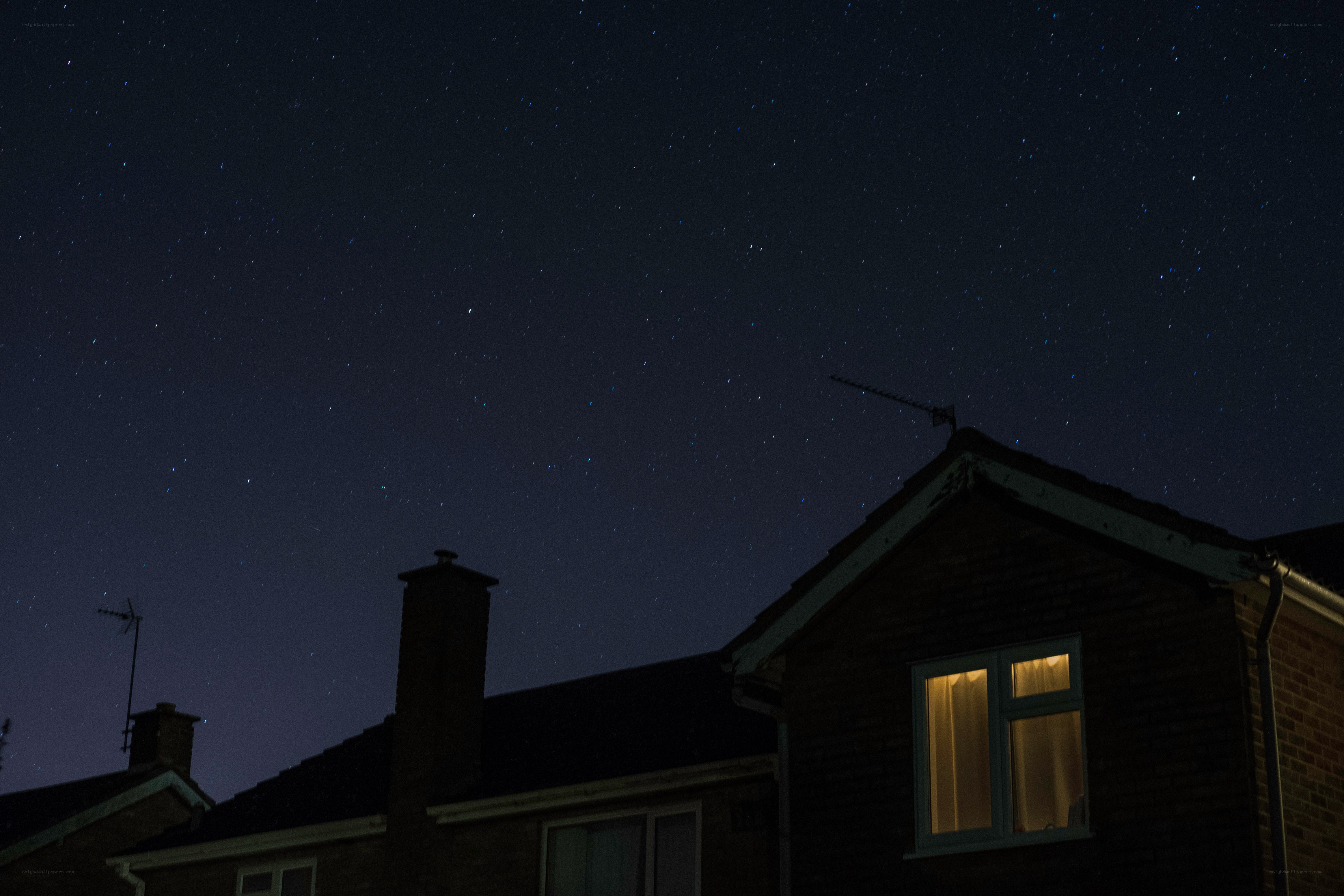 Stars over a house at night