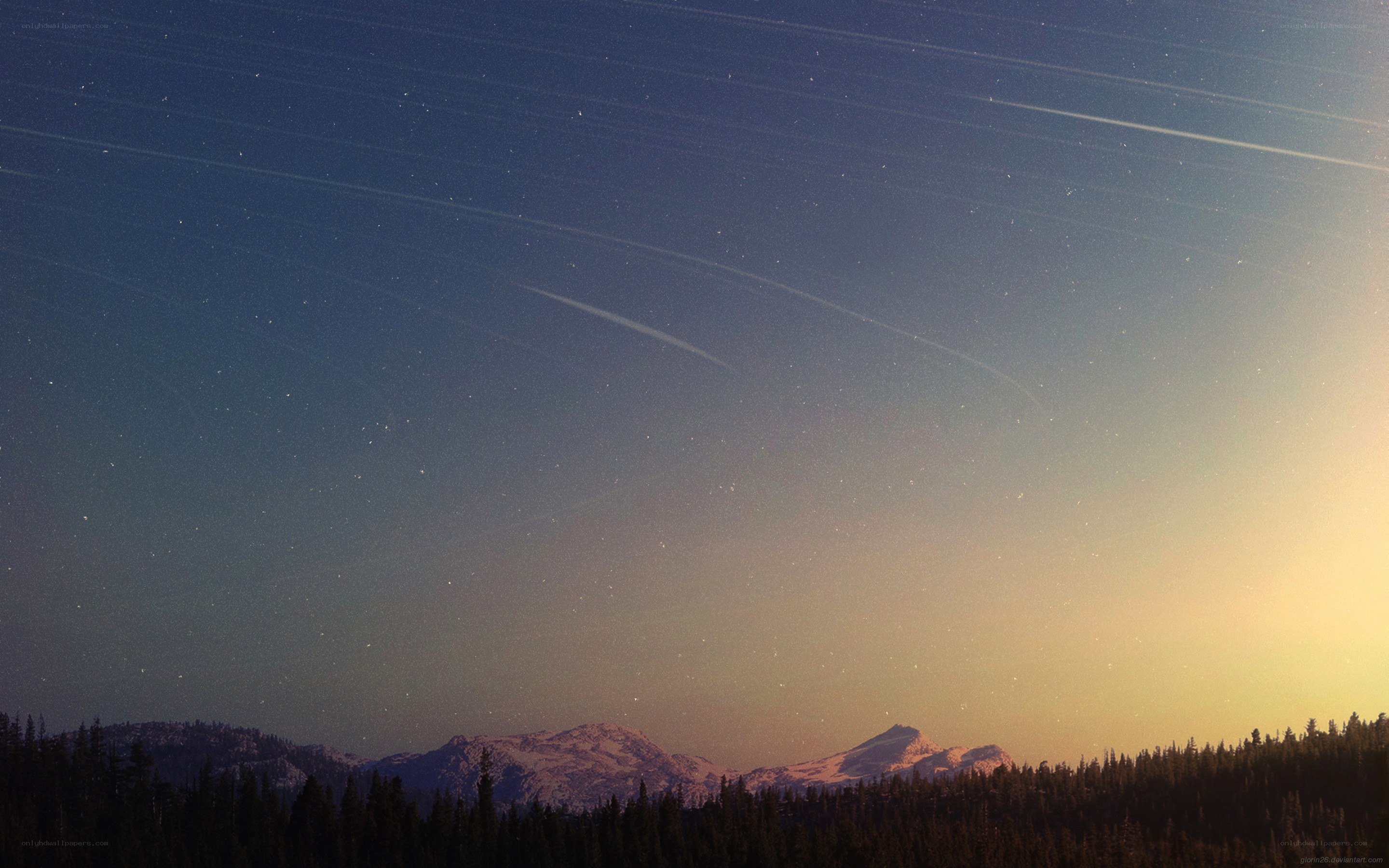 Stars over mountain peaks