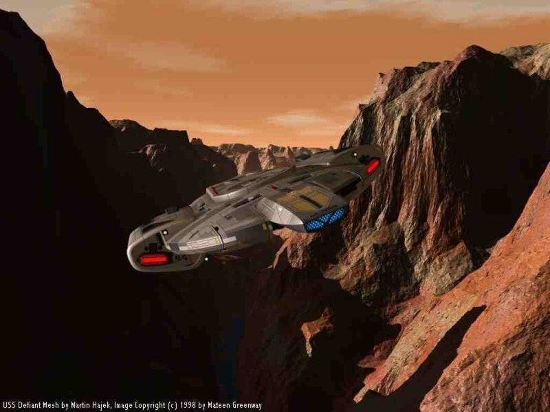 Starship in canyon landscape