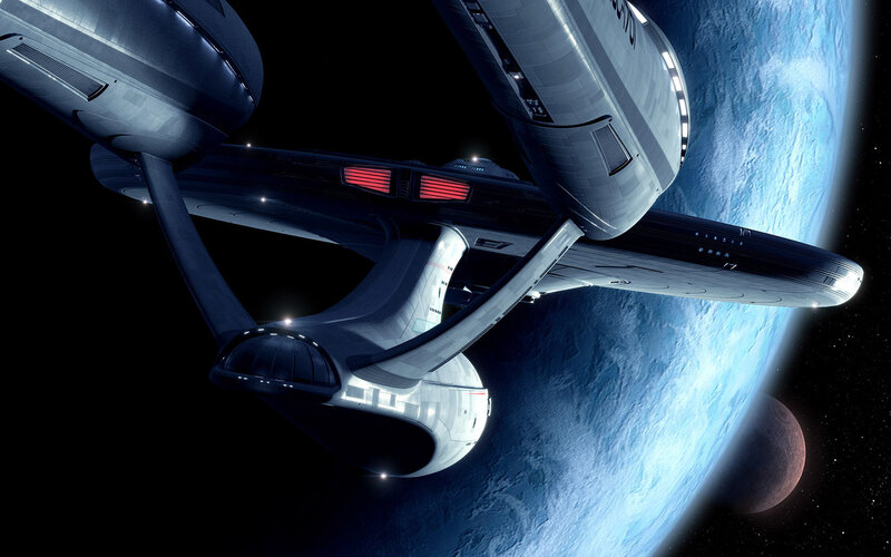 Starship near a blue planet
