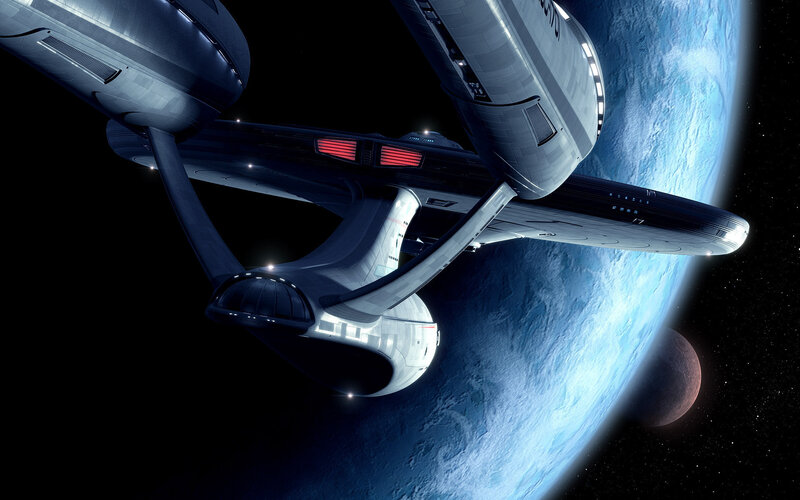 Starship near a blue planet