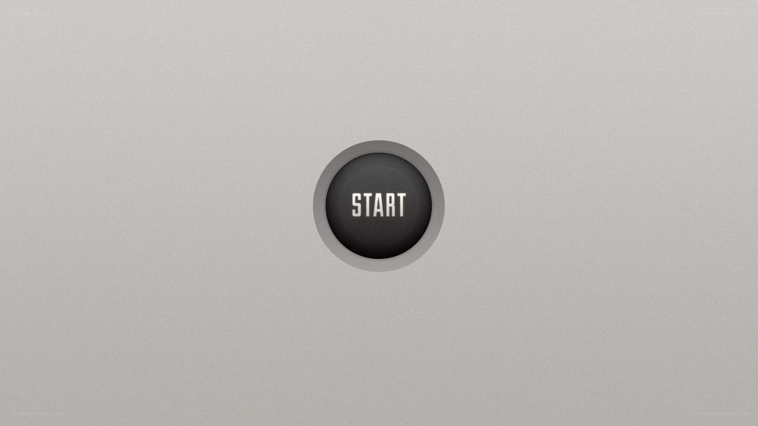 start button on gray surface