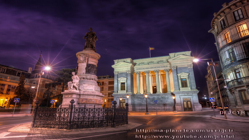 Statue and Building at Night