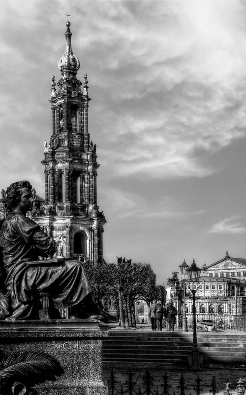 Statue and church tower in Dresden