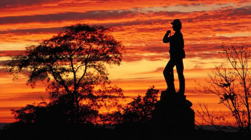 statue at sunset