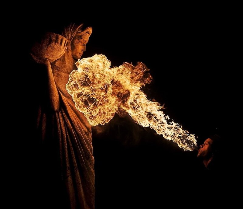 Statue Breathing Fire — Black