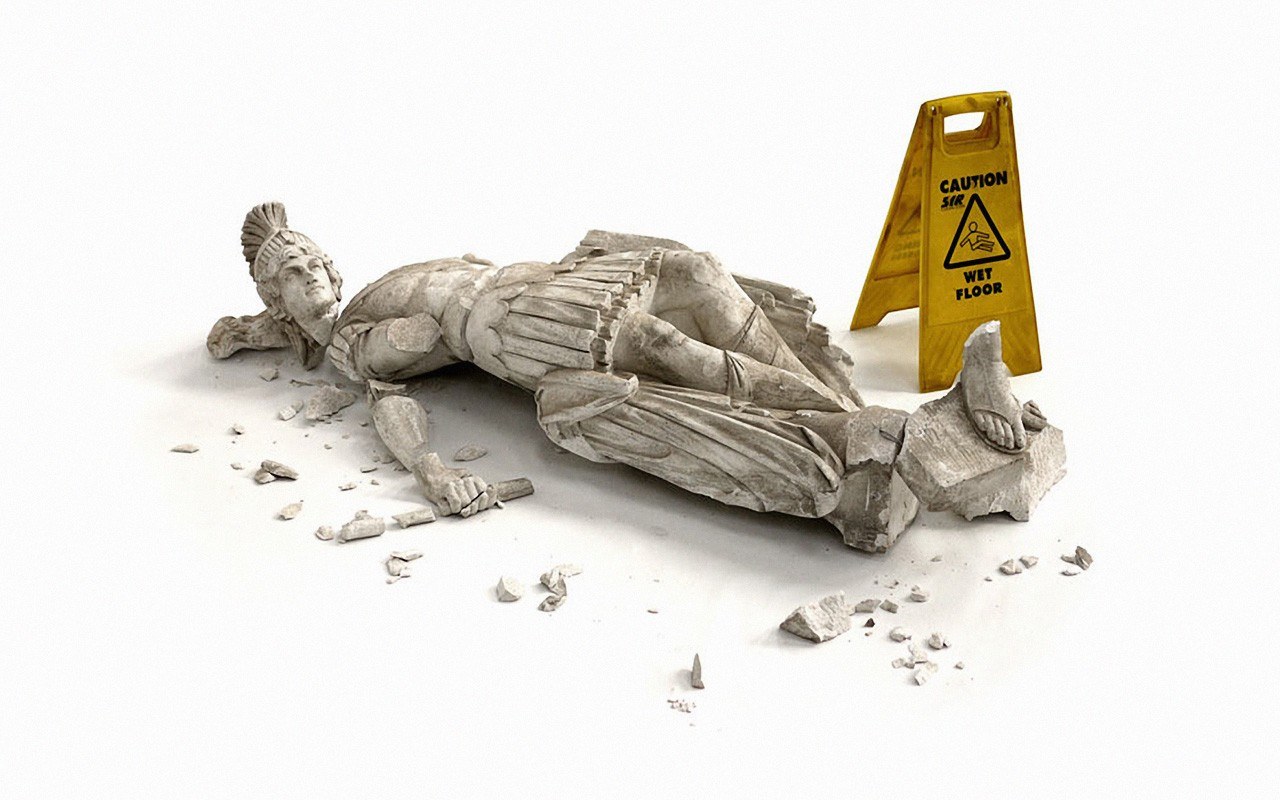 Statue broken on wet floor