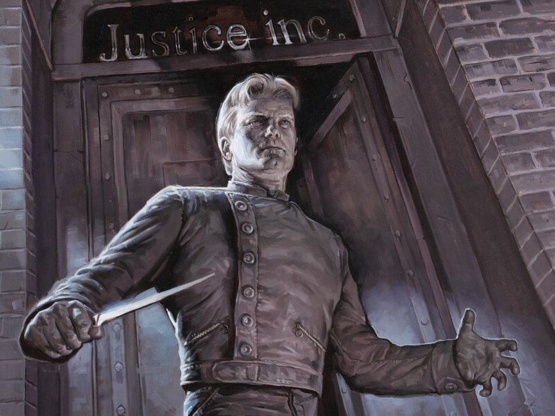 statue holding knife outside Justice Inc.