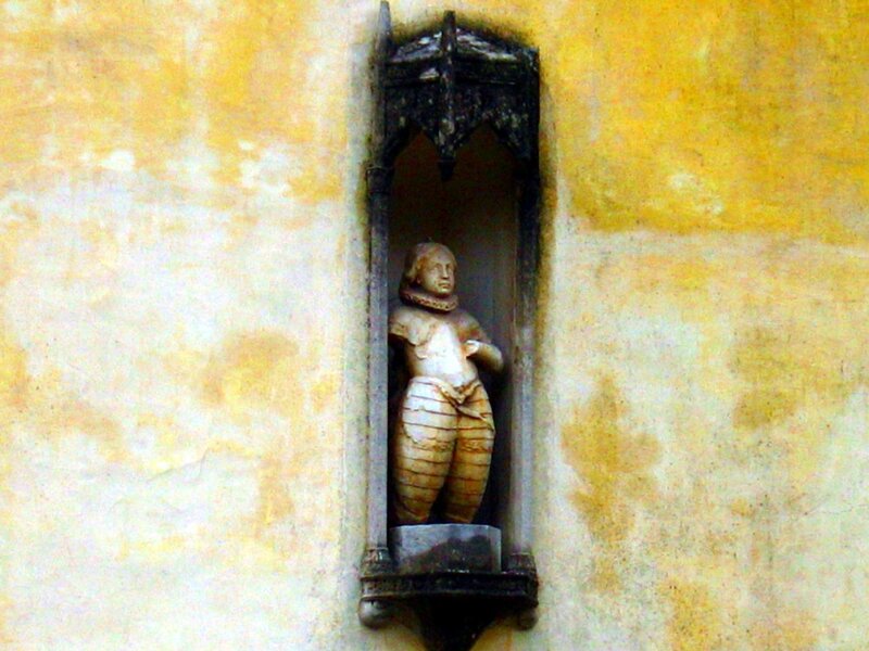 statue in a wall niche