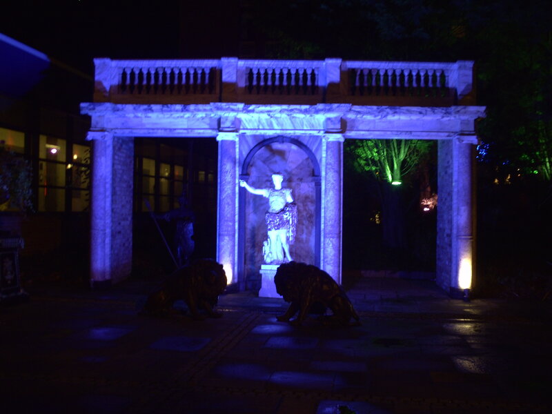 Statue in Archway at Night